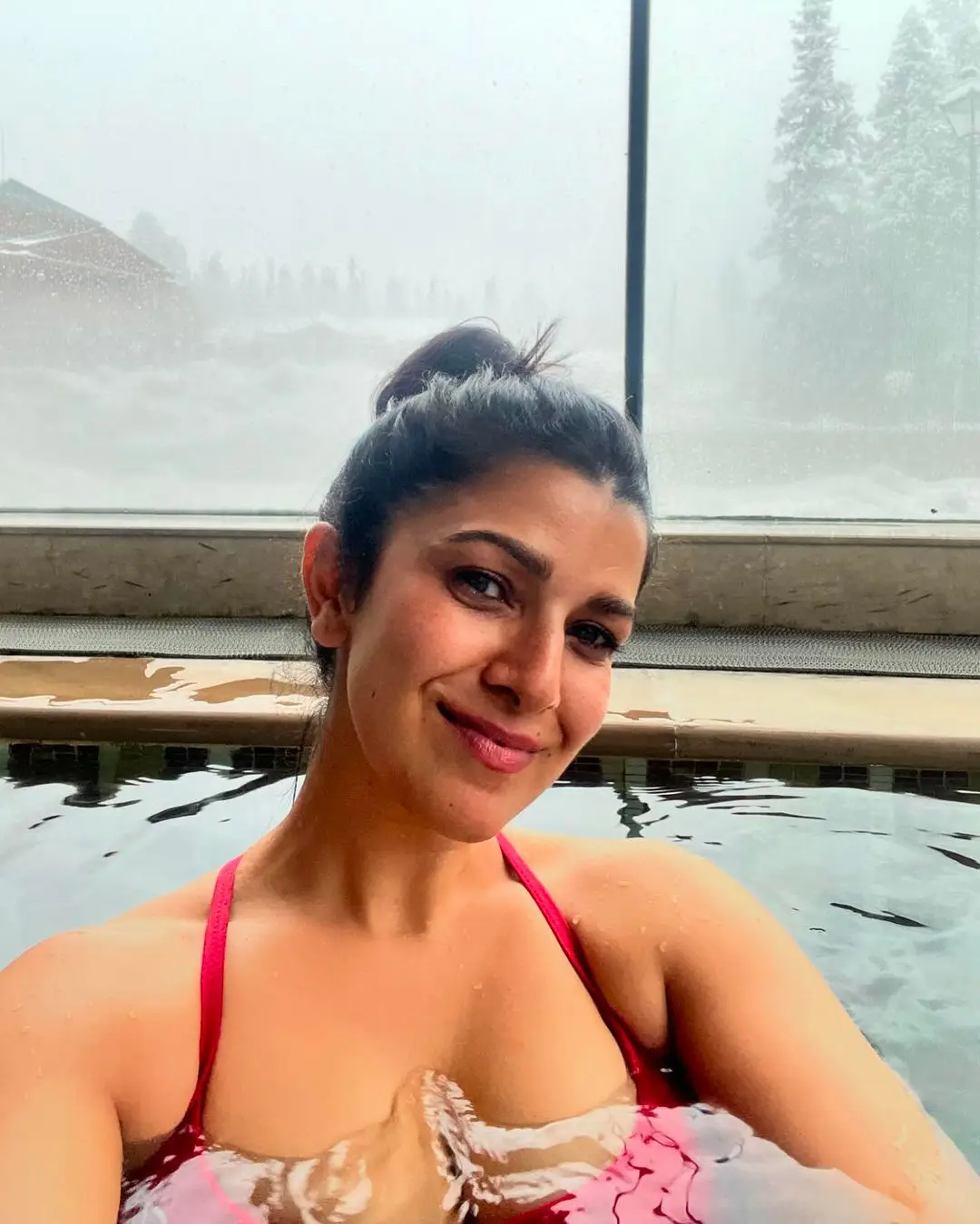 Bollywood Actress Nimrat Kaur Stills In Swimming pool